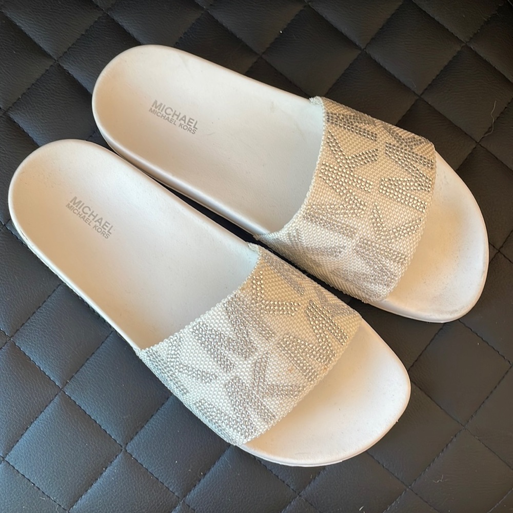 White slippers, MK gem symbol
